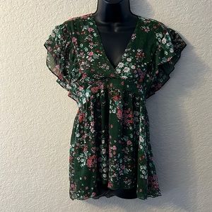 Sam & Max sheer floral top with side zipper. Great for summer!